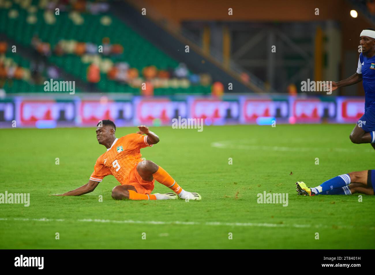 Karim Konaté unbalanced after contact with a Seychellois player Stock Photo