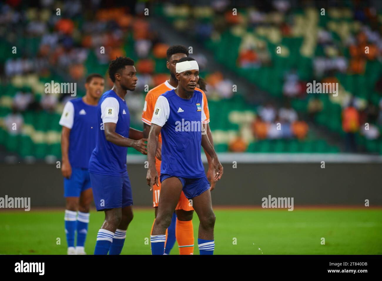 Seychellois players defending Ivorian Jean Philippe Krasso Stock Photo