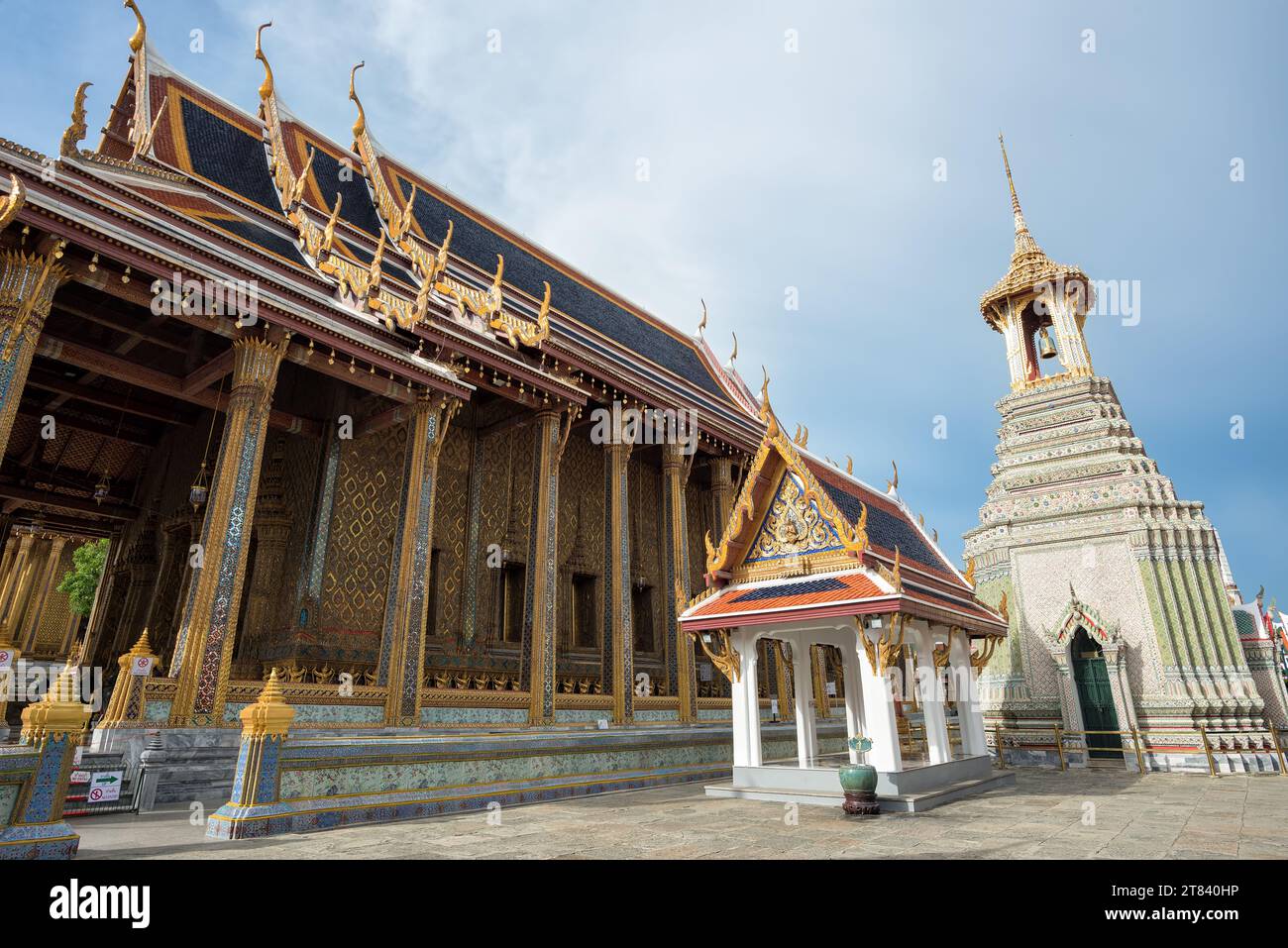 The artistic architecture and decoration of Phra Ubosot or The Chapel of The Emerald Buddha or Wat Phra Kaew, The Grand Palace, Thailand - The main Ph Stock Photo