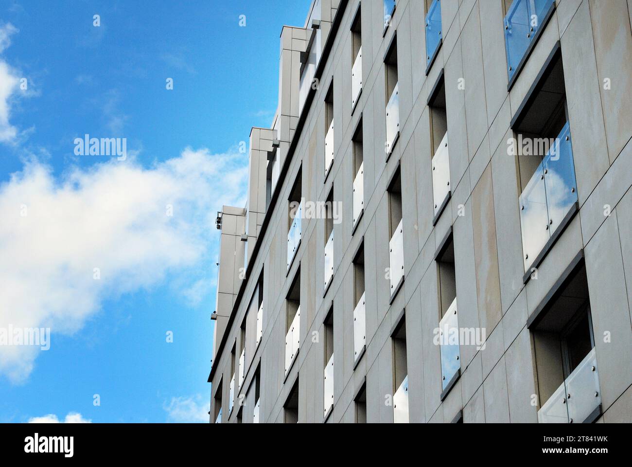 Modern apartment buildings on a sunny day with a blue sky. Facade of a ...