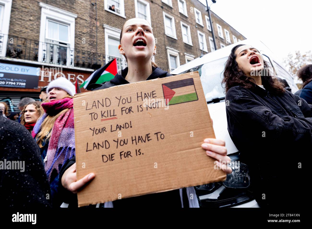 London, UK. 18th Nov, 2023. A protester seen holding a placard during the rally outside the office of Sir Keir Starmer at Camden, London. Pro-Palestinian supporters gathered outside the office of Sir Keir Starmer, the leader of Labour Party in the UK and the Member of Parliament for Holborn and St Pancras, hundreds of local rallies in the UK are demanding a ceasefire on Israel-Gaza War. (Photo by Hesther Ng/SOPA Images/Sipa USA) Credit: Sipa USA/Alamy Live News Stock Photo