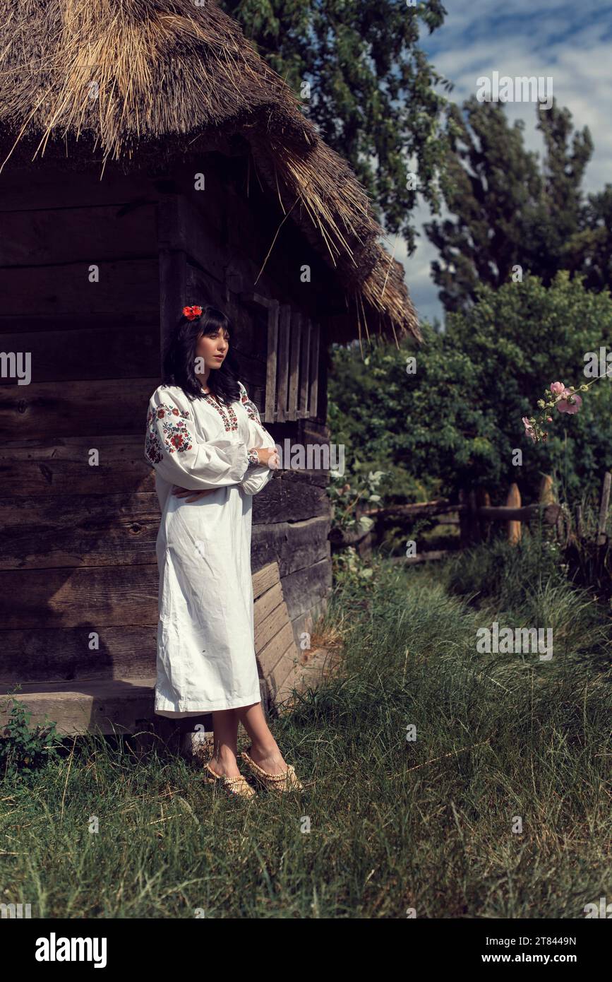 Girl in a folk costume in a national park Stock Photo