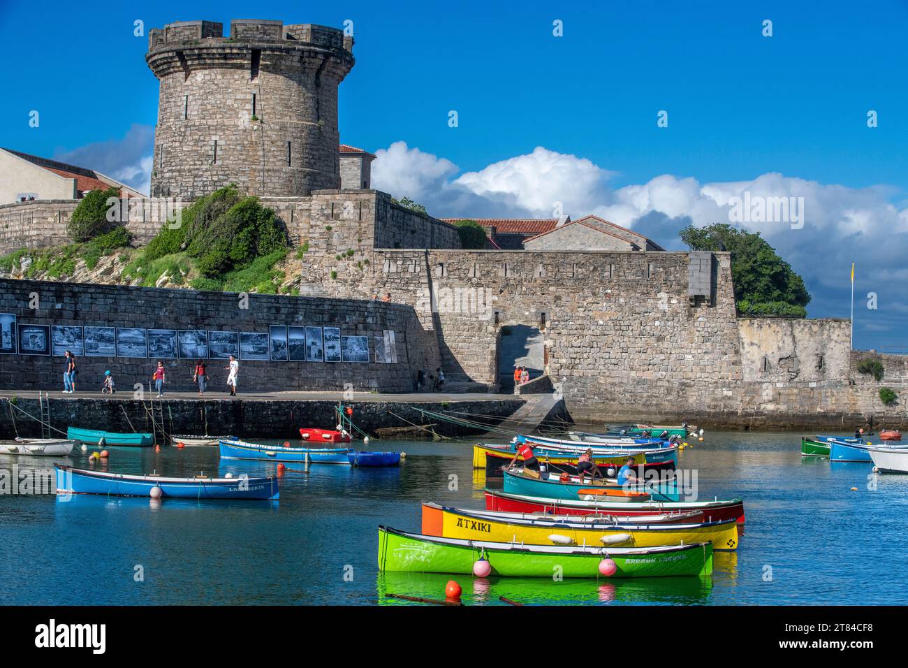 Le fort Vauvan de Socoa and the fishing harbour of Ciboure, Basque country. France Small coloreful fish boats on the old port of cituadel in front of Stock Photo