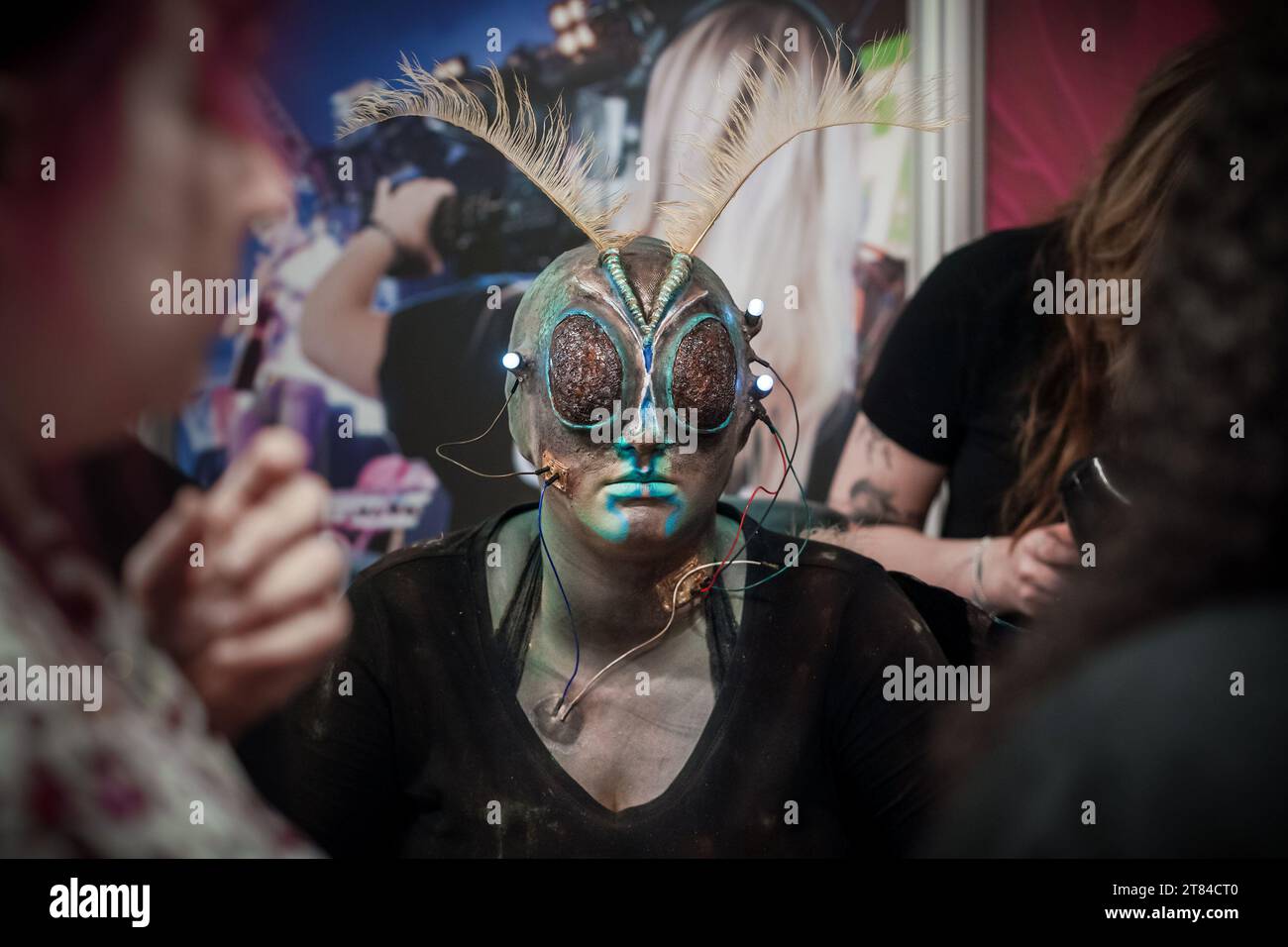 Coventry, UK. 18th November 2023. Striking makeup and prosthetic