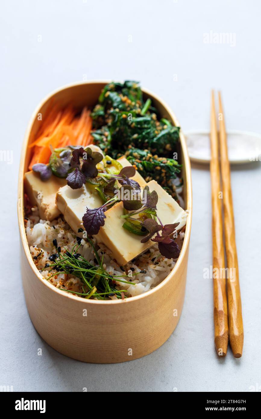 Japanese lunch with silken tofu, rice and spinach gomae Stock Photo