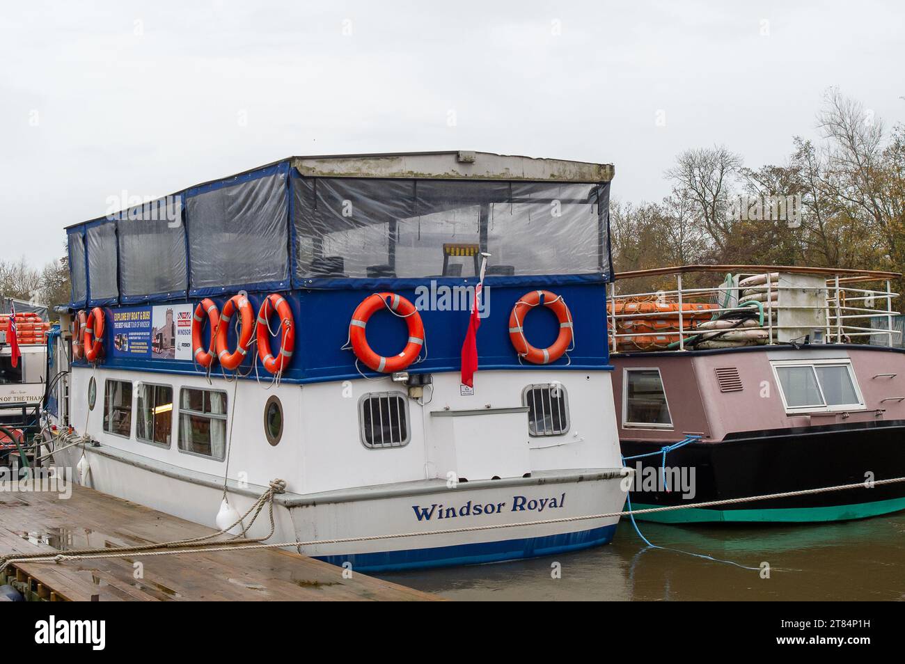 Egham, UK. 18th November, 2023. French Brothers boats moored on the River Thames on another damp and drizzly day today in Egham, Surrey Credit: Maureen McLean/Alamy Stock Photo