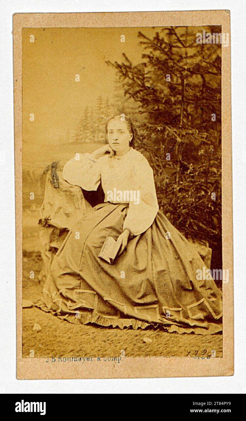 Johann B. Rottmayer Portrait of a young lady, sitting with a book in his hand. Albuminpapier / Visitformat 1850-1890 , 1850/1890 Stock Photo
