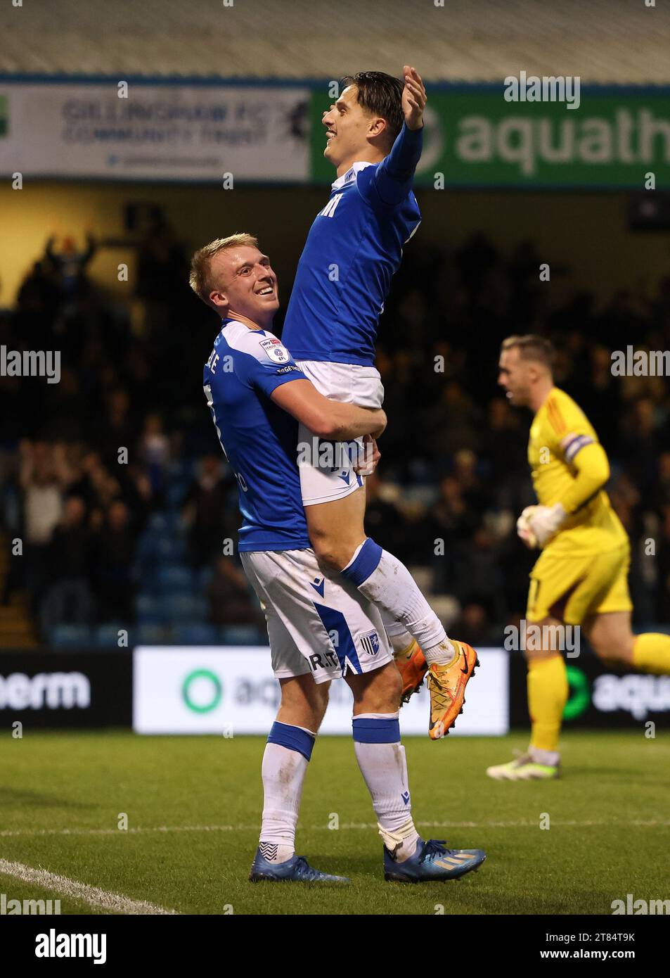 Gillingham's Tom Nichols celebrates with Gillingham's Lapslie