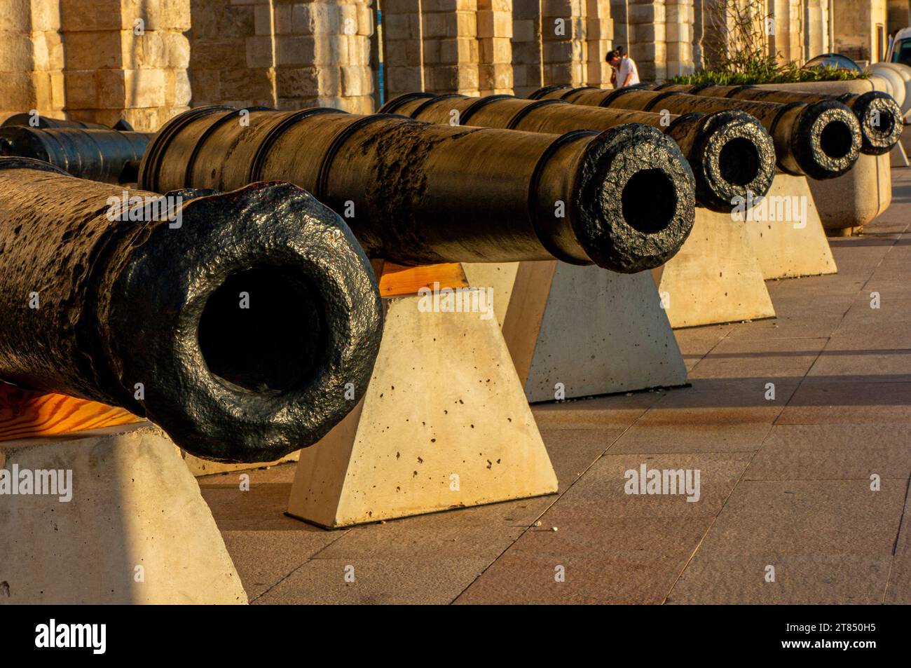 Cannons on the waterfront in Birgu, one of the Three Cities outside Valletta in Malta Stock Photo