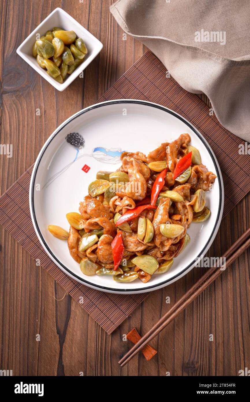 stir fried pork intestines with Laba garlic(Pickled Garlic Stock Photo
