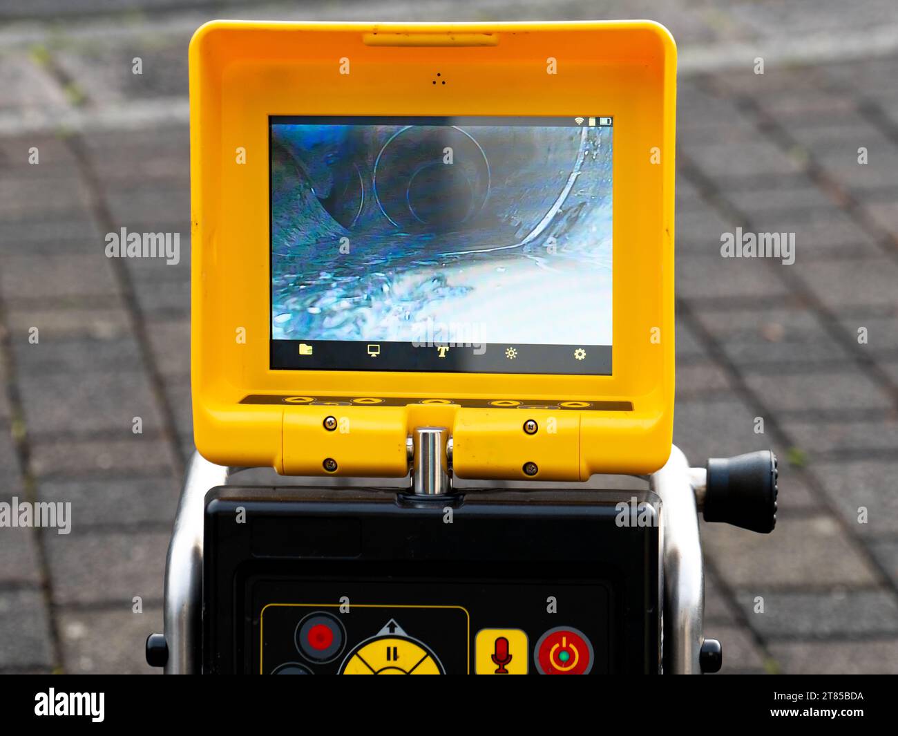A drain cleaning company checks a blocked drain with a camera before