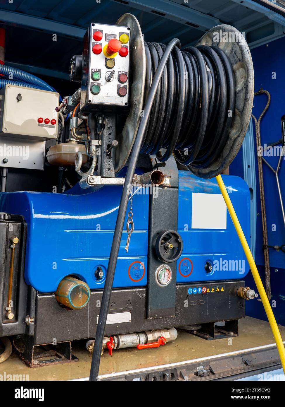 Sewer cleaning equipment service vehicle. Equipment for hydraulic flushing of urban sewerage. control panel, hoses, pumps, pressure gauges Stock Photo