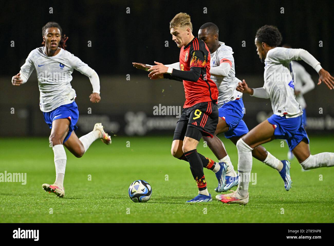 Tubize, Belgium. 18th Nov, 2023. Brahim TRAORE (5) of France, Yoan KORE (15) of France and Therence KOUDOU (20) of France pictured defending on Norman Bassette (9) of Belgium during a friendly soccer game between the national under 20 teams of Belgium and France on Saturday 18 November 2023 in Tubize, Belgium . Credit: sportpix/Alamy Live News Stock Photo