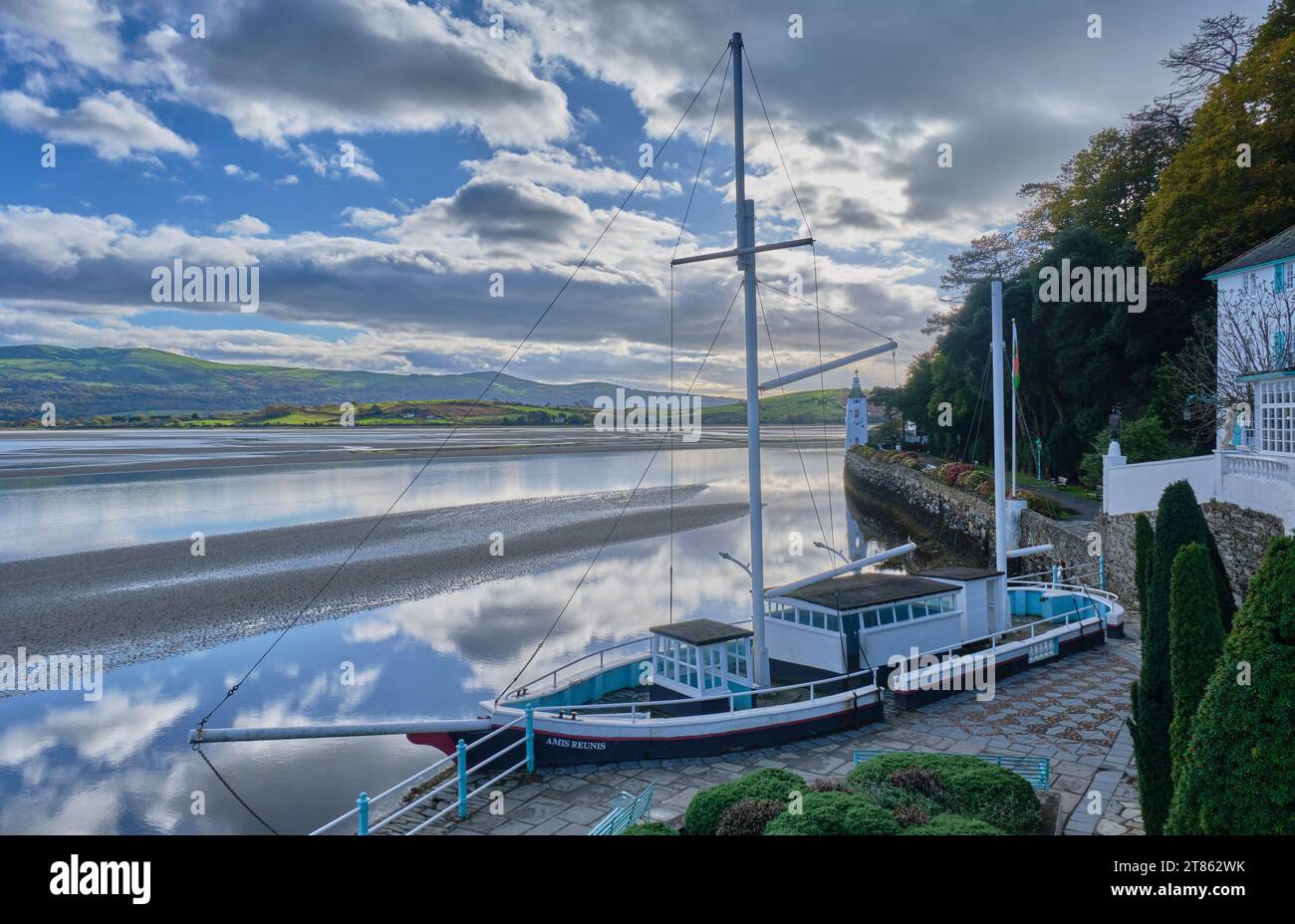 The Amis Reunis and The Watchtower on the quayside by the Afon Dwyryd Estuary, Portmeirion, Gwynedd, Wales Stock Photo