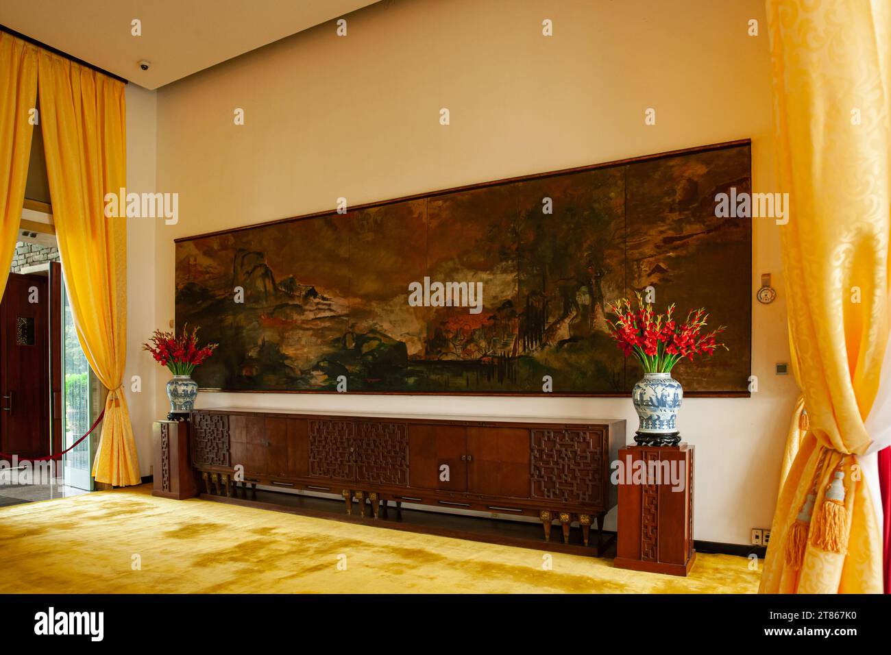 Ho Chi Minh city, Vietnam, March 25 2023: interior of Independence Palace also publicly known as the Reunification Convention Hall, Gold state banquet Stock Photo