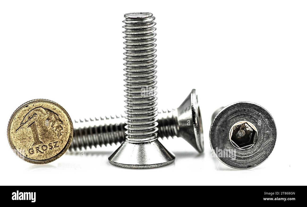DIN 7991 bolt stainless steel close up white background Stock Photo - Alamy