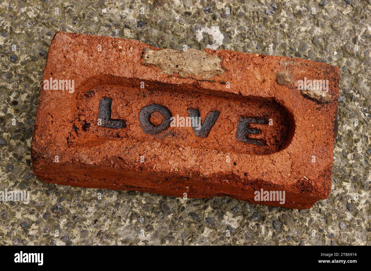 LOVE, OLD BRICK FROM COUNTY DURHAM, ENGLAND Stock Photo