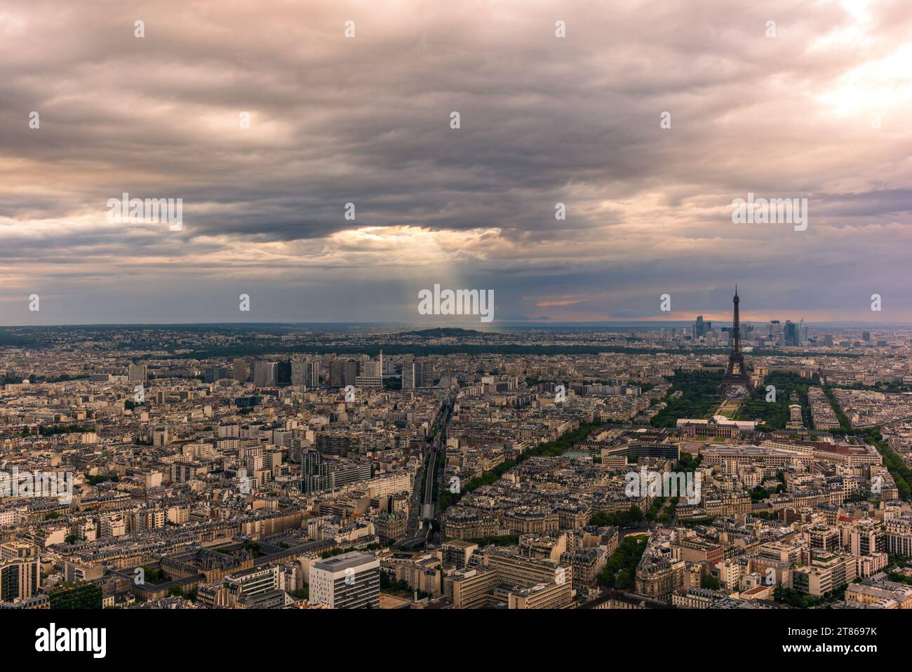 A colorful sunset on Paris before the rain in summer Stock Photo