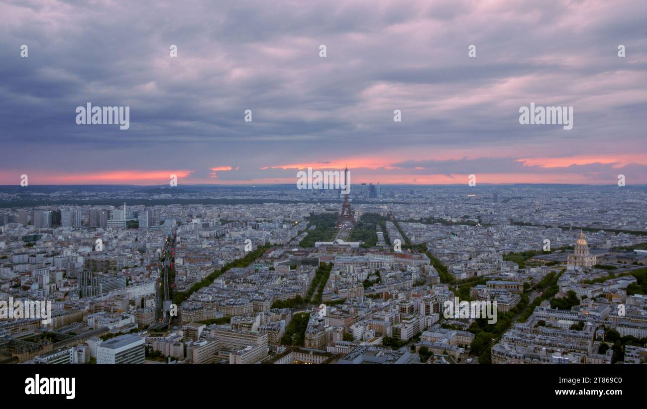 A colorful sunset on Paris before the rain in summer Stock Photo