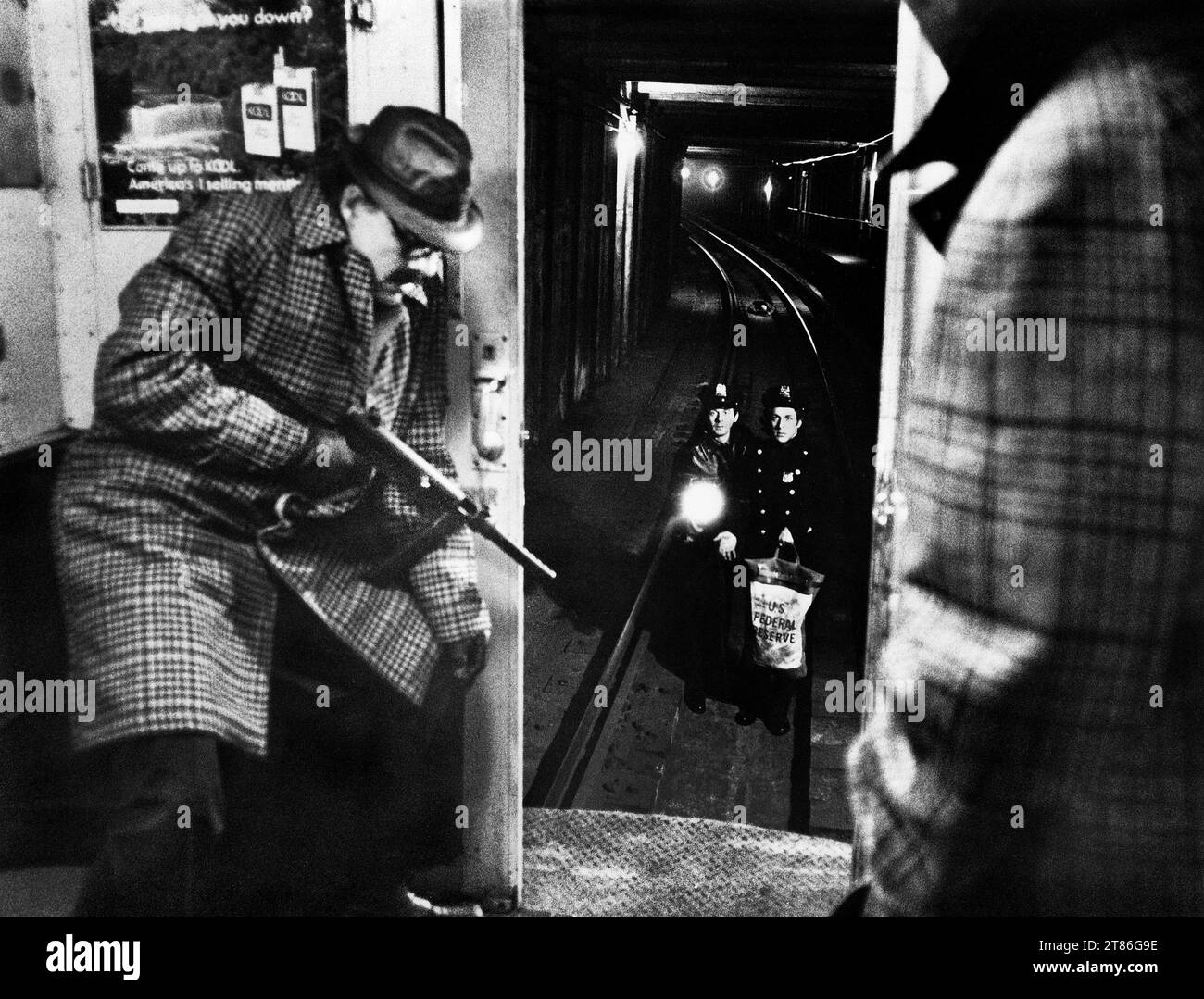 Robert Shaw (with gun), on-set of the film, 'The Taking Of Pelham One Two Three', United Artists, 1974 Stock Photo