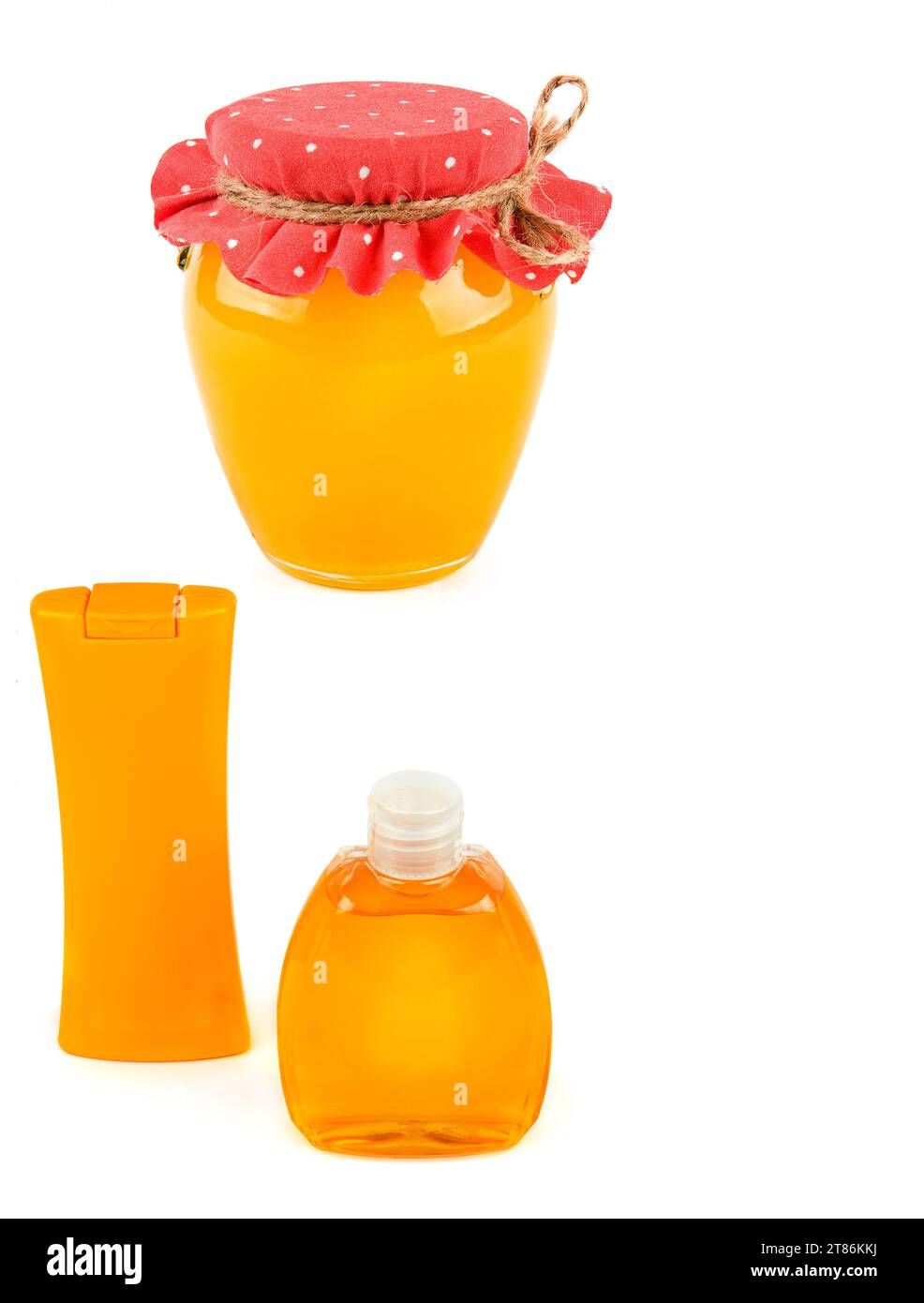 Bottles with shampoo and shower gel, a jar of honey isolated on a white