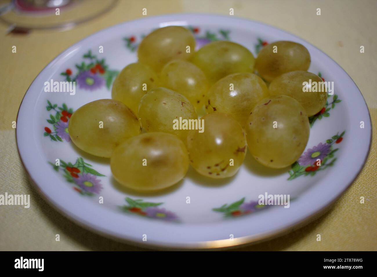 twelve grapes of good luck eaten in the first seconds of New Year Stock