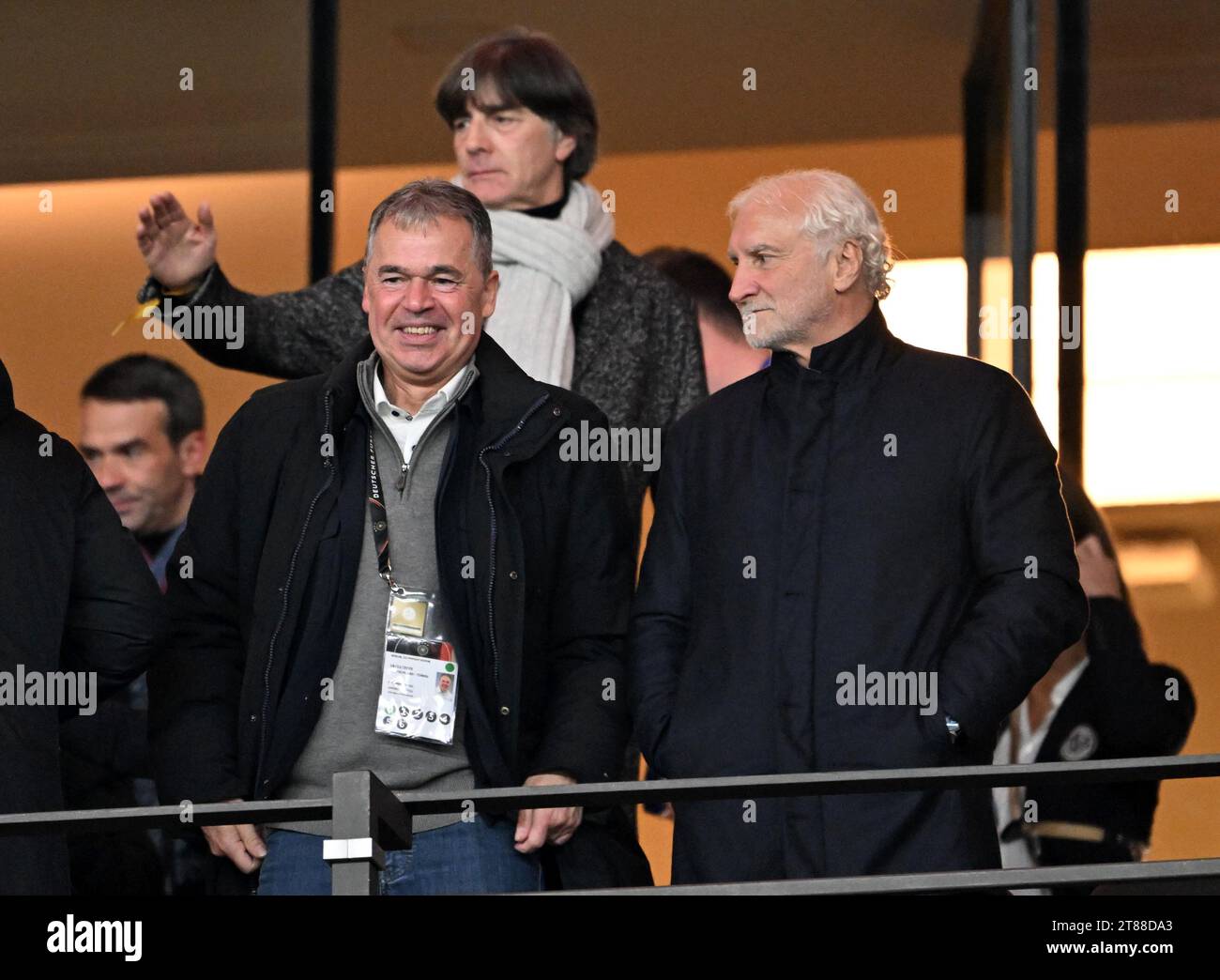 Berlin, Germany. 19th Nov, 2023. Soccer: International match, Germany - Turkey, Olympic Stadium. Andreas Rettig (l), Managing Director Sport DFB, Joachim Löw (o), former national coach, and Rudi Völler, Director of the German senior men's national team, in the stands. IMPORTANT NOTE: In accordance with the regulations of the DFL German Football League and the DFB German Football Association, it is prohibited to use or have used photographs taken in the stadium and/or of the match in the form of sequential images and/or video-like photo series. Credit: Federico Gambarini/dpa/Alamy Live News Stock Photo