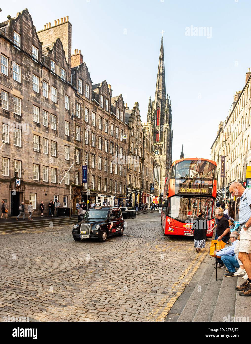 EDINBURGH, SCOTLAND - September 7 2023: The black taxi is a common sight on the streets of the UK. The hackney carriages carry a roof sign to indicate Stock Photo