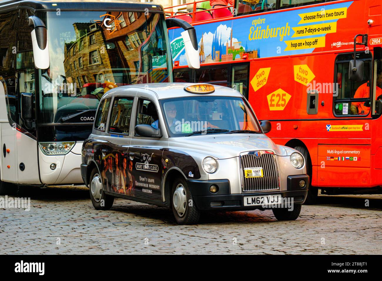 EDINBURGH, SCOTLAND - September 7 2023: The black taxi is a common sight on the streets of the UK. The hackney carriages carry a roof sign to indicate Stock Photo