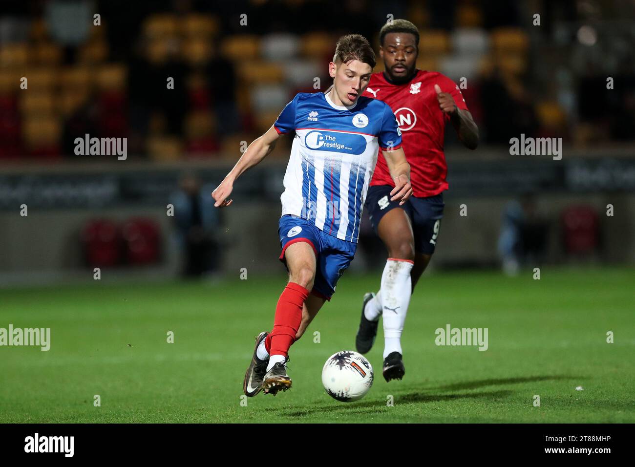 Hartlepool United's Joe Grey in action with York City's Dipo Akinyemi