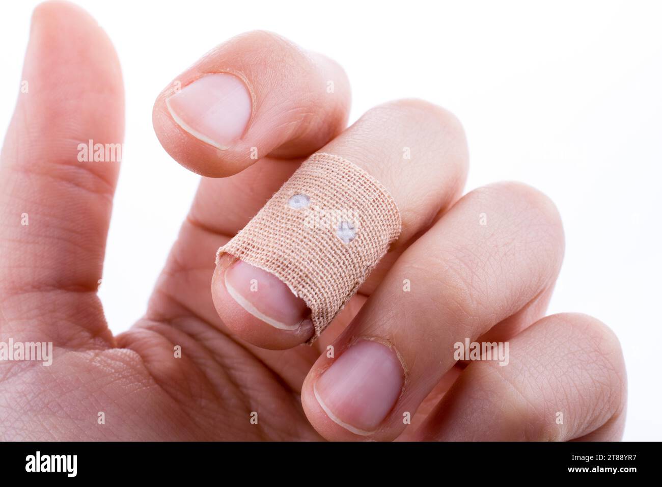 Cut finger white bandage hi-res stock photography and images - Alamy