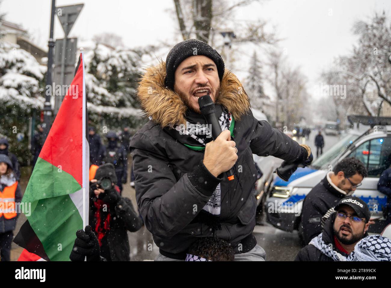 A demonstrator shouts slogans during a solidarity rally with Palestine ...