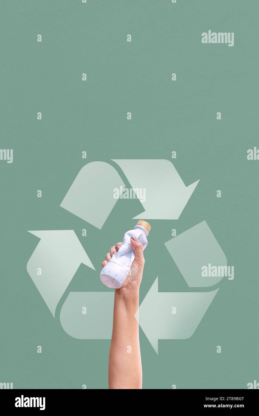 female's Hands Collecting plastic bottles waste for recycling. Stock Photo