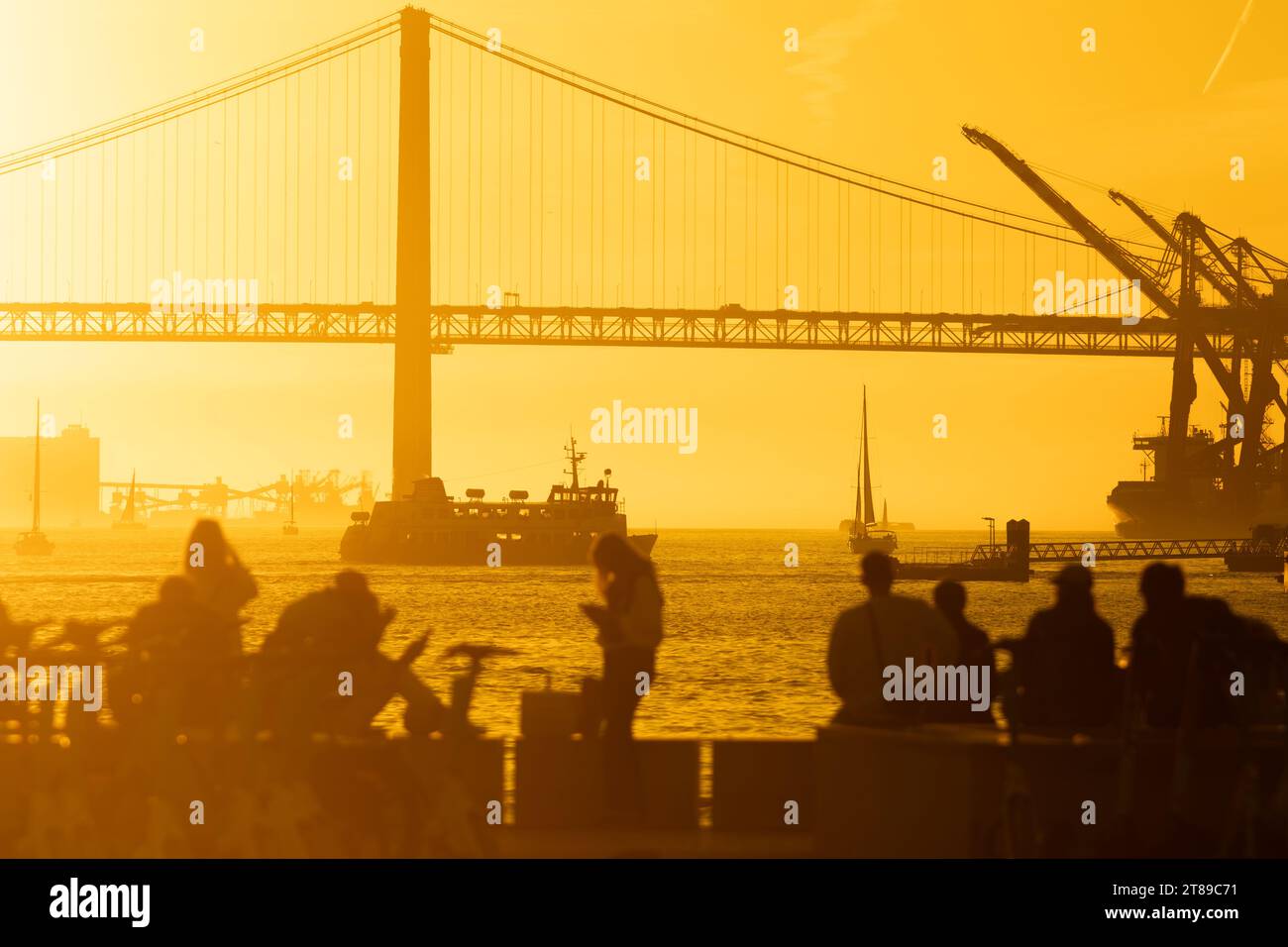 Sunset Silhouette: People Gathering on Pier, Bridge Over Ocean Stock ...