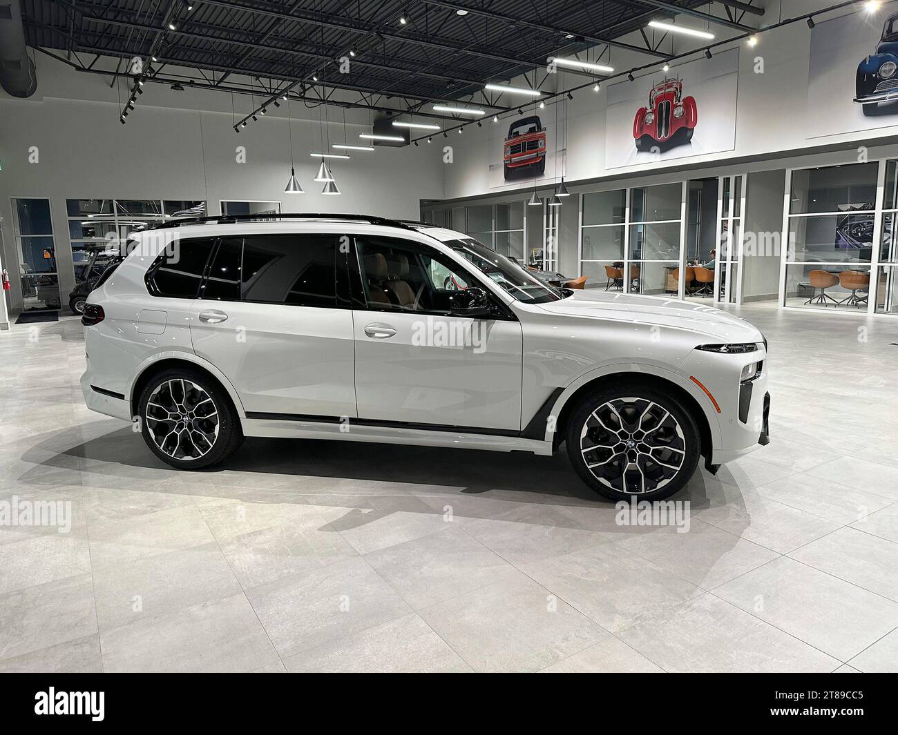 An unsold 2024 X7 sports-utility vehicle sits on the showroom floor of ...