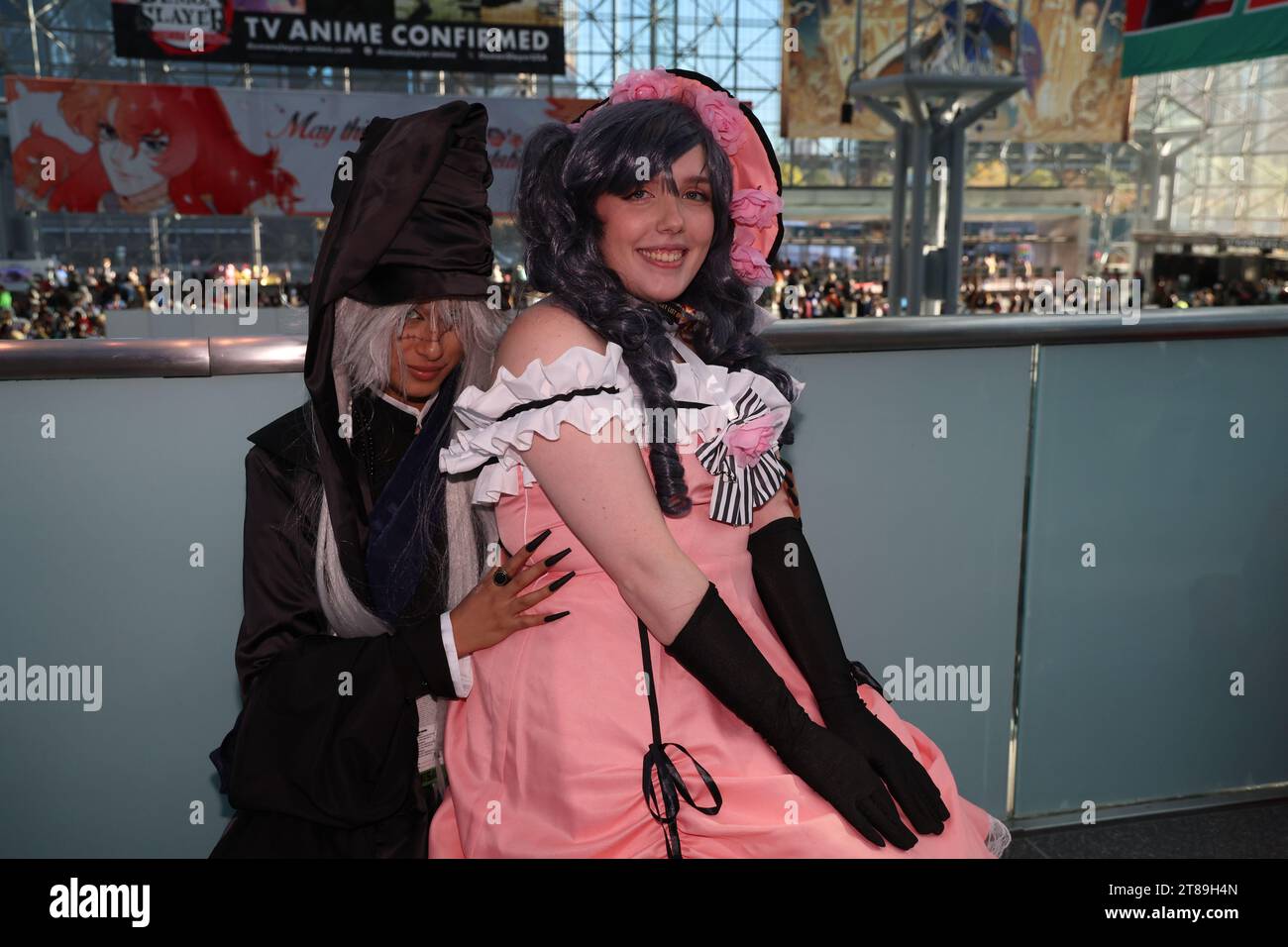 New York City, United States. 18th Nov, 2023. Cosplayer Tava from Brooklyn is dressed as the Undertaker from Black Butler and Claire from St. Louis is dressed as Earl Ciel Phantomhive from Black Butler for the 2023 Anime NYC at the Jacob Javits Center on October 18, 2023 in New York City. (Photo: Gordon Donovan) (Photo by Gordon Donovan/NurPhoto) Credit: NurPhoto SRL/Alamy Live News Stock Photo