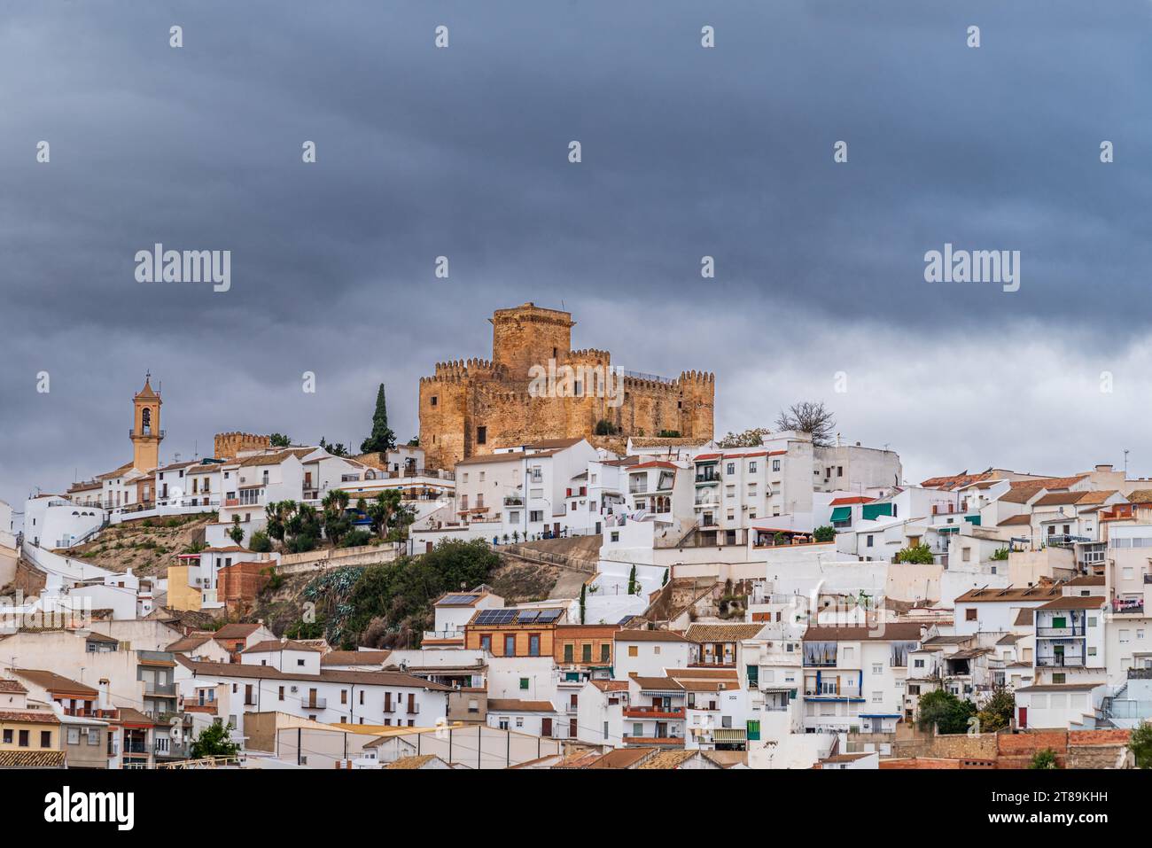 Ducal Castle of Espejo, Cordoba, built on a hilltop and surrounded by white houses, Andalucia Stock Photo