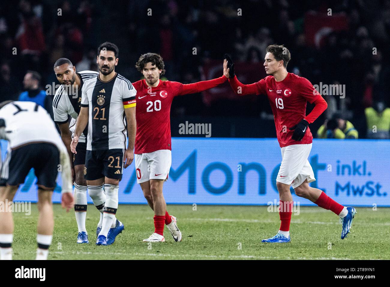 Berlin, Olympiastadion, 18.11.23: Ferdi Kadioglu of turkey celebrates scoring the 1:1 goal with Kenan Yildiz of turkey while Ilkay Guendogan of German Stock Photo