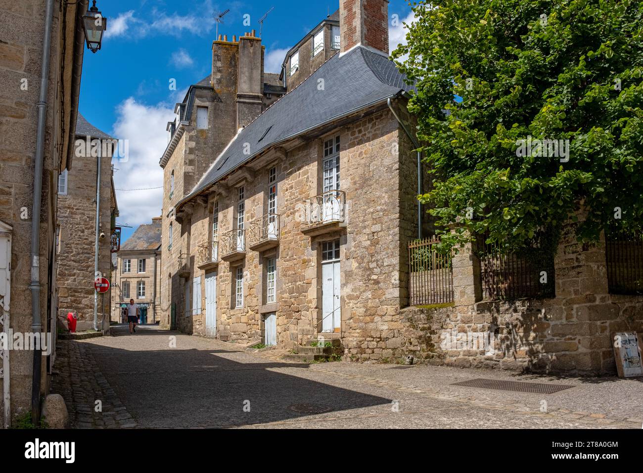 A classical architecture house  in Moncontour, Brittany, France, taken on a sunny summer day with no people Stock Photo