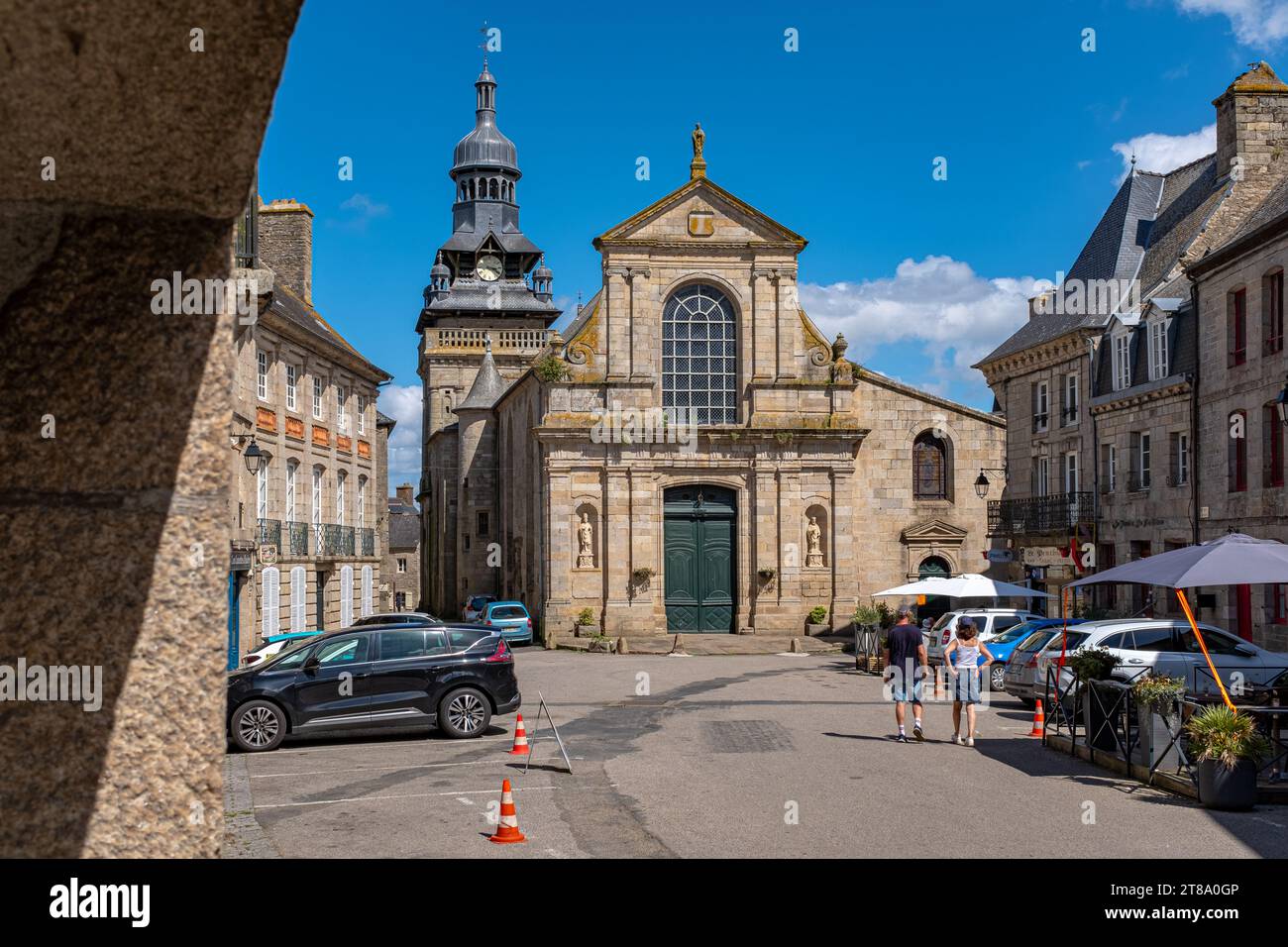 Moncontour, Brittany, France - August 19, 2023: The renaissance facade of the Saint-Mathurin church of Moncontour, taken on a sunny summer day with a Stock Photo