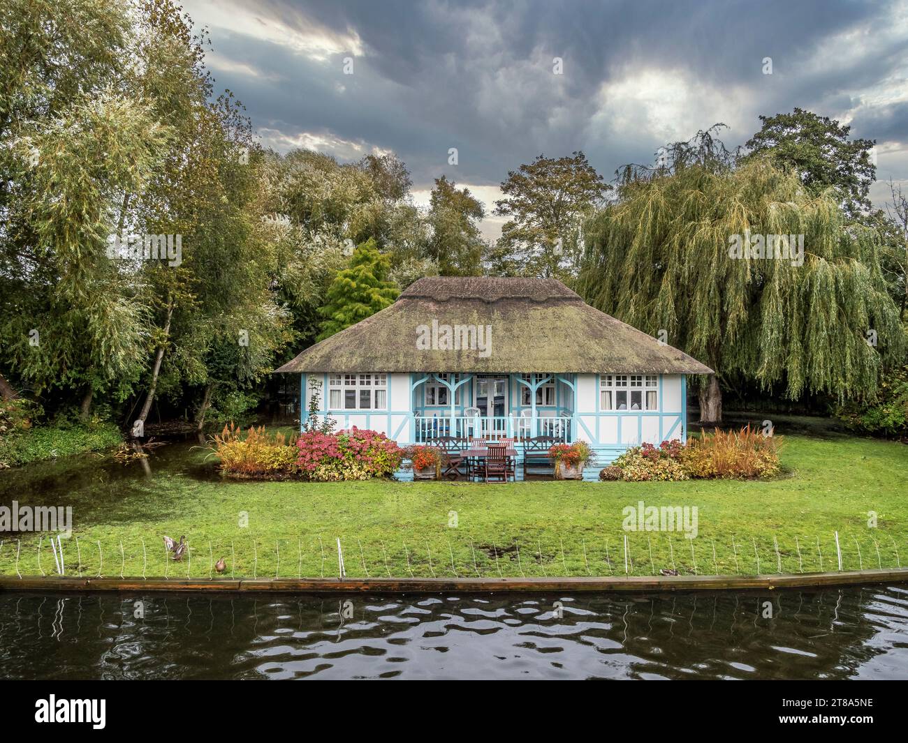 The image is of very expensive properties located on the Wroxham Broads ...