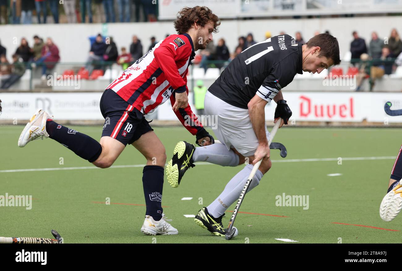Brussels, Belgium. 19th Nov, 2023. Leopold's Jean-Baptiste Forgues and Racing's Jerome Truyens fight for the ball during a hockey game between Royal Leopold Club and Royal Racing Club Bruxelles, Sunday 19 November 2023, in Uccle/ Ukkel, Brussels, on day 13 of the Belgian first division hockey championship. BELGA PHOTO VIRGINIE LEFOUR Credit: Belga News Agency/Alamy Live News Stock Photo