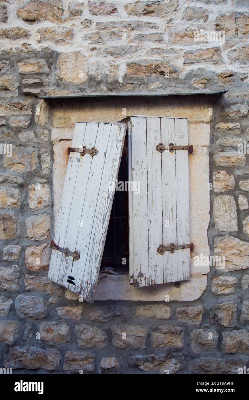 Broken old window in Budva, Montenegro Stock Photo