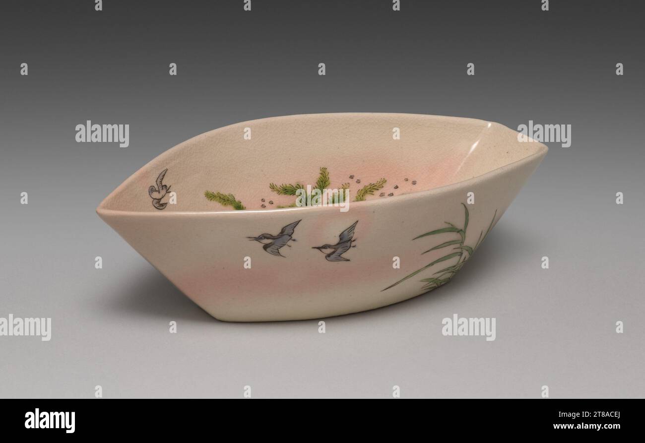 While porcelain was their primary specialization, all the members of the Seif? studio also made stoneware painted with iron oxide designs under the glaze and with color enamel and gold over the glaze. Many examples are further characterized by pink dots brought out during firing and by crackling in the glaze. Works of this type are classified as Kyoto ware, after the city where the style developed. People used the ceramics for a diversity of purposes, from everyday dining to chanoyu, or Japanese tea practice. Boat-Shaped Bowl with Plovers, 1893–97. Seifū Yohei III (Japanese, 1851–1914). Stonew Stock Photo
