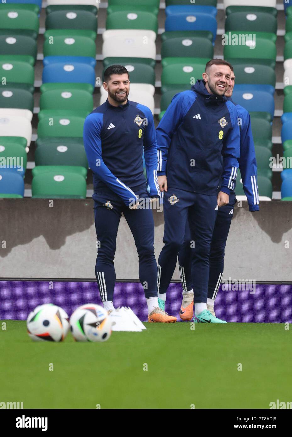National Football Stadium at Windsor Park, Belfast, Northern Ireland, UK. 19th Nov 2023. The Northern Ireland squad train ahead of tomorrow evenings football match against Denmark in a Euro 2024 qualifier, their last in the qualifying group. Jordan Jones (left) and Conor McMenamin. Credit: David Hunter/Alamy Live News. Stock Photo