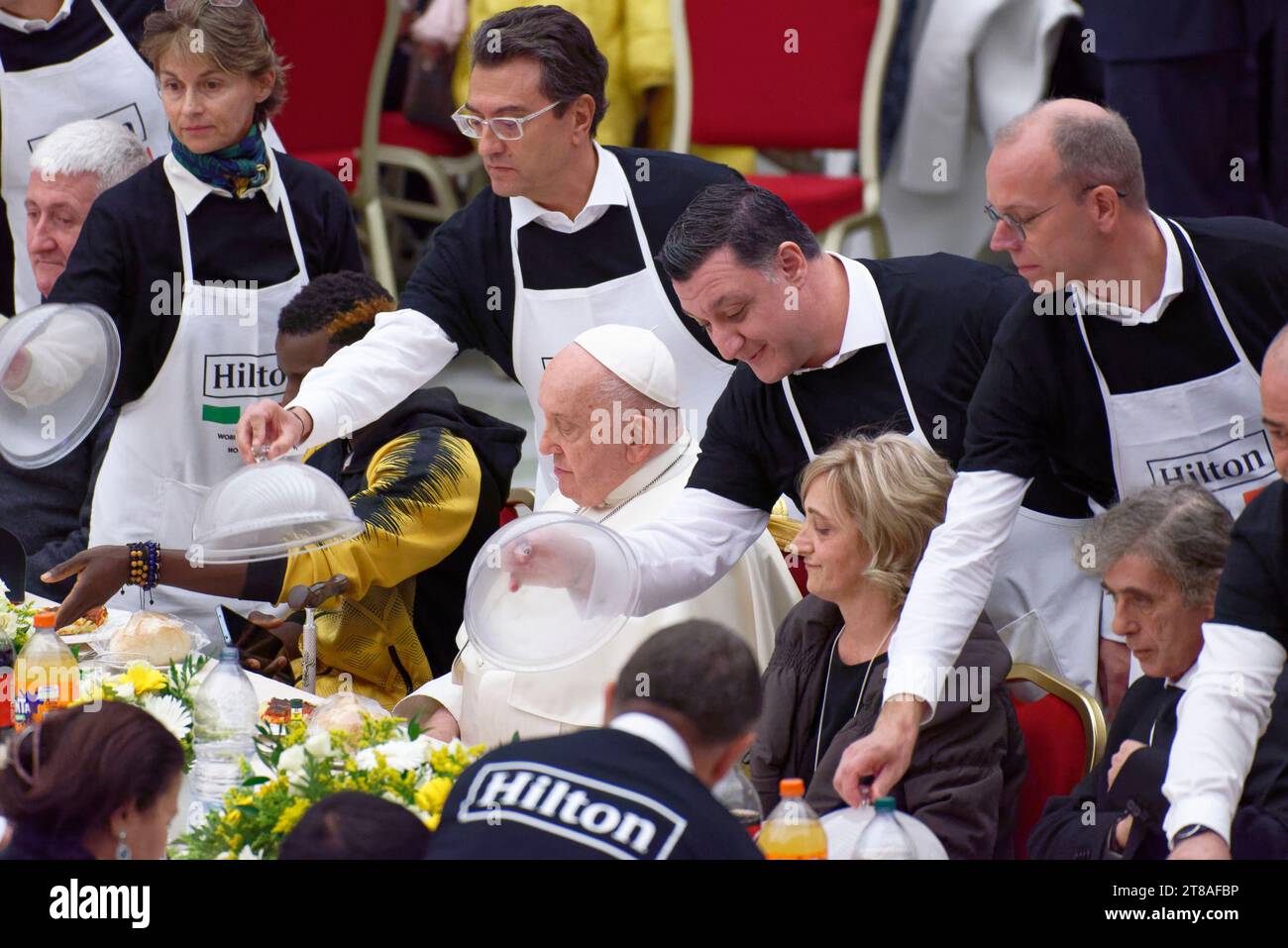 Vatican City, Vatican. 19th Nov 2023. Pope Francis arrives to take part at a lunch, in the Paul VI Hall at the Vatican, Sunday, Nov. 19, 2023. Pope Francis offered several hundred poor people, homeless, migrants, unemployed a lunch on Sunday as he celebrates the World Day of the Poor with a concrete gesture of charity in the spirit of his namesake, St. Francis of Assisi Credit: Massimo Valicchia/Alamy Live News Stock Photo