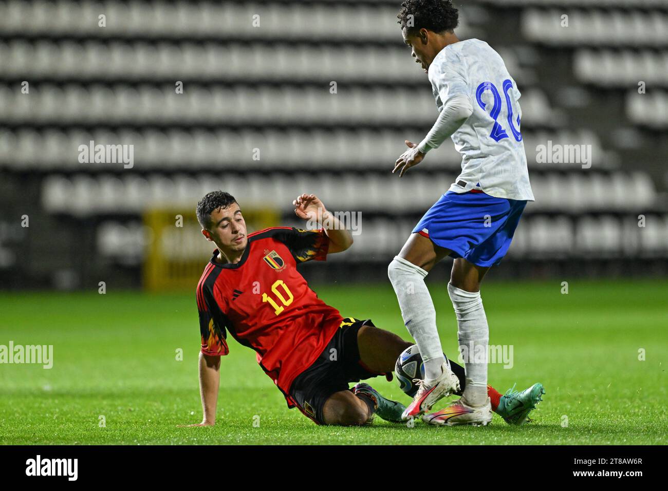 Tubize, Belgium. 18th Nov, 2023. Mohamed Salah El Boukammiri (10) of Belgium pictured fighting for the ball with Therence KOUDOU (20) of France during a friendly soccer game between the national under 20 teams of Belgium and France on Saturday 18 November 2023 in Tubize, Belgium . Credit: sportpix/Alamy Live News Stock Photo