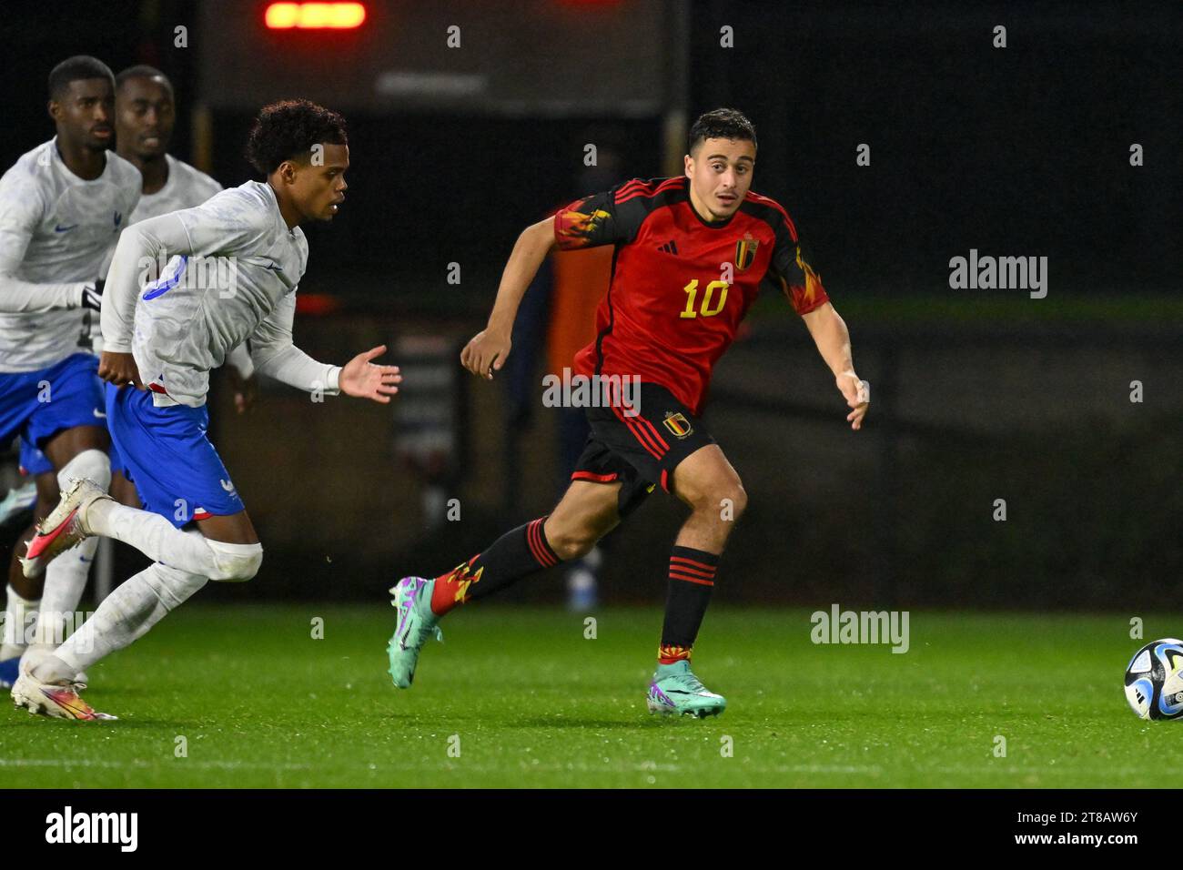 Tubize, Belgium. 18th Nov, 2023. Therence KOUDOU (20) of France pictured defending on Mohamed Salah El Boukammiri (10) of Belgium during a friendly soccer game between the national under 20 teams of Belgium and France on Saturday 18 November 2023 in Tubize, Belgium . Credit: sportpix/Alamy Live News Stock Photo
