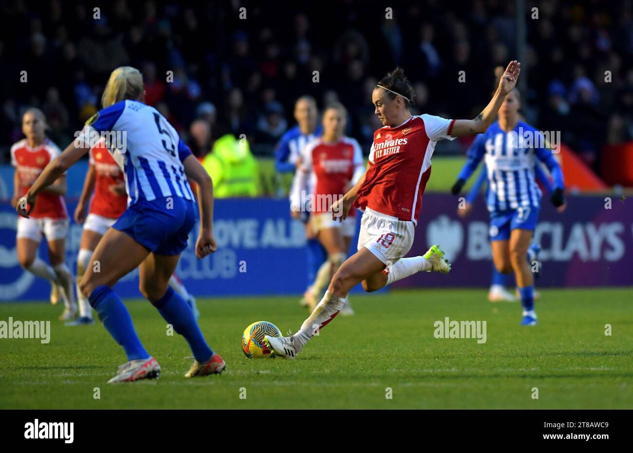 Crawley UK 19th November 2023 - Caitlin Foord of Arsenal shoots and scores their second goal  during the Barclays  Women's Super League football match between Brighton & Hove Albion and Arsenal at The Broadfield Stadium in Crawley : Credit Simon Dack /TPI/ Alamy Live News Stock Photo
