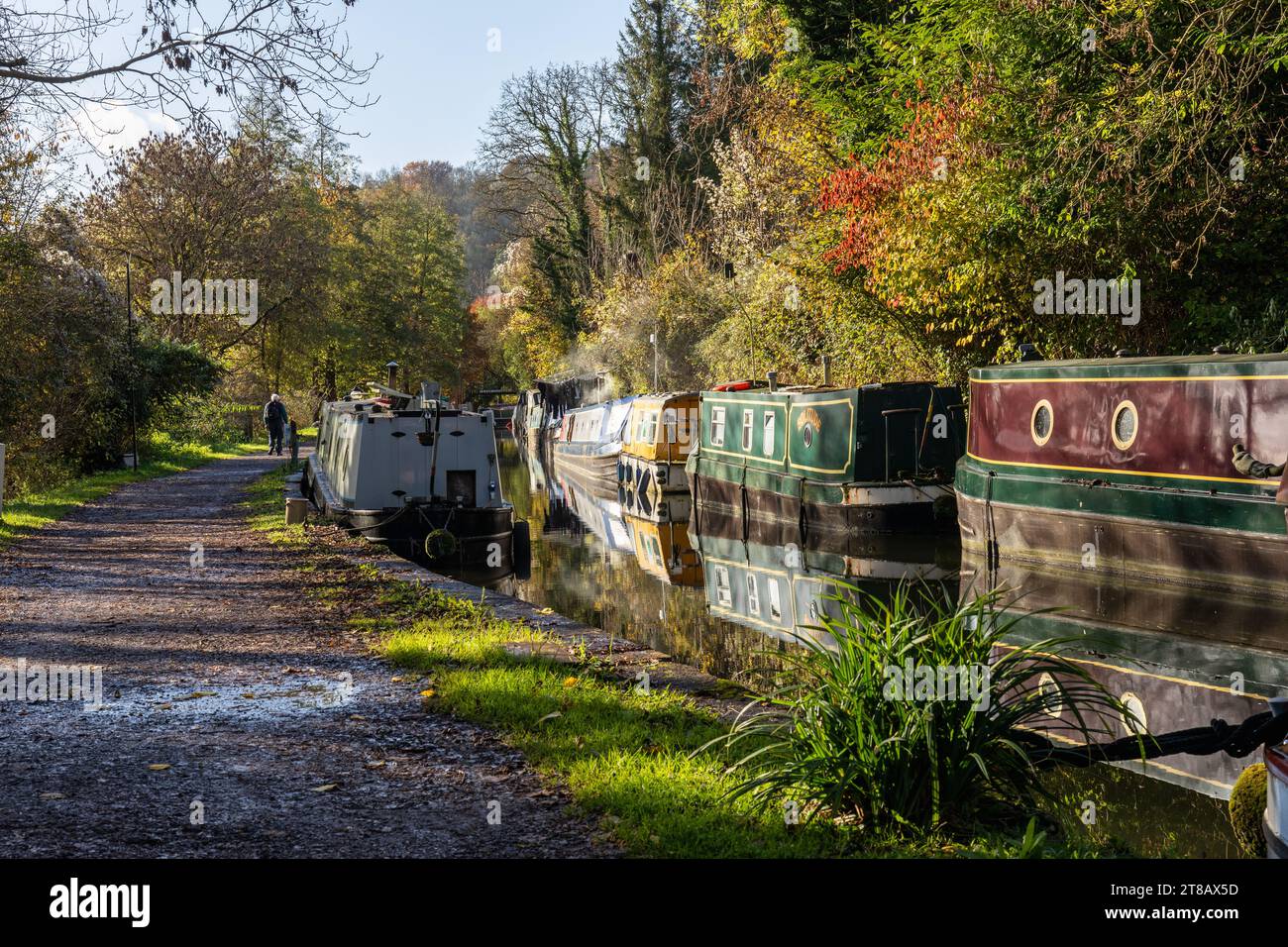 Canal boats on the Somerset Coal Canal off the Kennet and Avon Canal beside the historic Dundas Aqueduct in Autumn, Somerset, England, UK Stock Photo